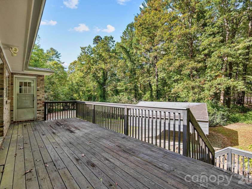 3214 Debbie Drive, Hendersonville, NC 28791.  MLS# CAR4310243, YatesRealty ID 2498. Large rear deck