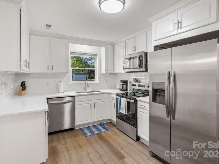 2328 Sanders Avenue, Charlotte, NC 28216.  MLS# CAR4213878, YatesRealty ID 24981. 