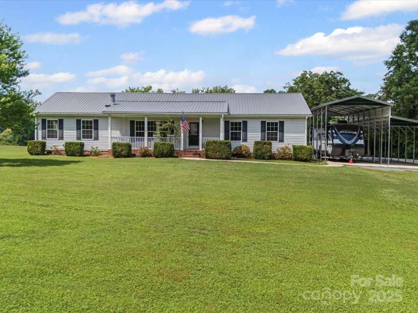 714 Helms Efird Road, Marshville, NC 28103.  MLS# CAR4263348, YatesRealty ID 24982. 