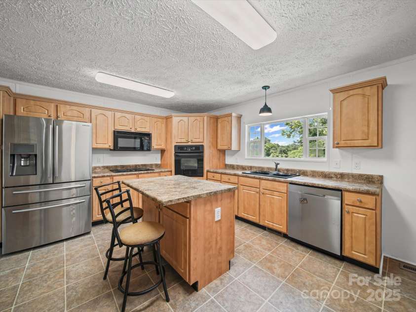 714 Helms Efird Road, Marshville, NC 28103.  MLS# CAR4263348, YatesRealty ID 24982. 