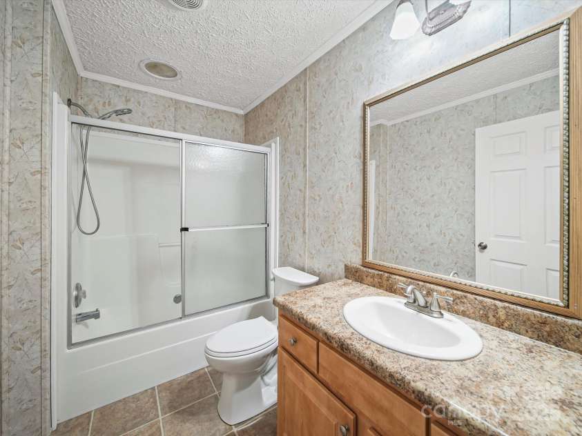 714 Helms Efird Road, Marshville, NC 28103.  MLS# CAR4263348, YatesRealty ID 24982. 