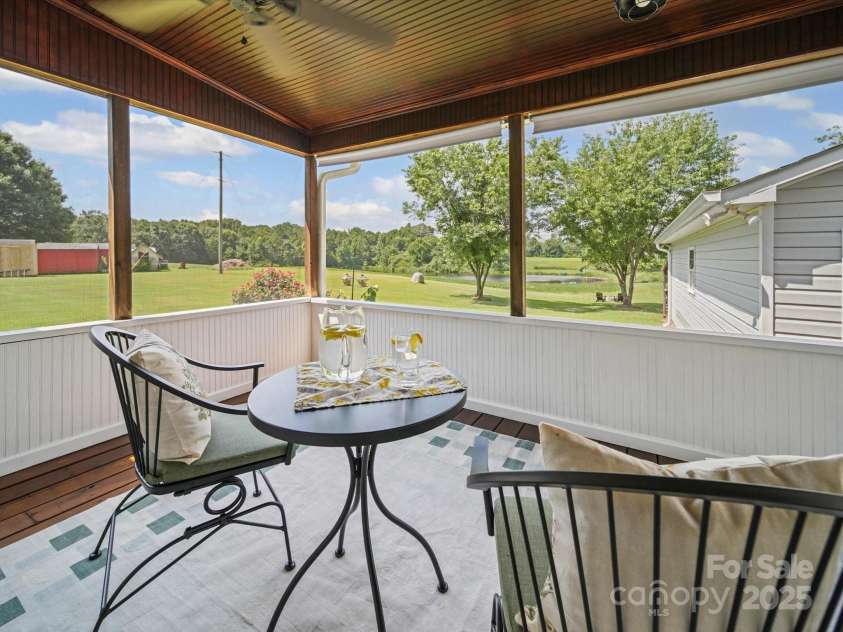 714 Helms Efird Road, Marshville, NC 28103.  MLS# CAR4263348, YatesRealty ID 24982. Screened Porch