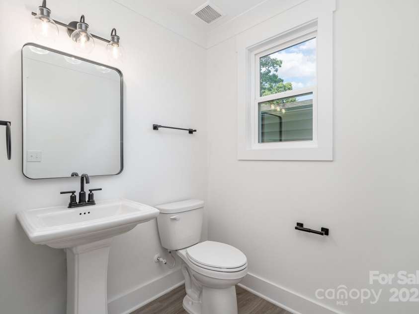 318 Sixth Street, Belmont, NC 28012.  MLS# CAR4271977, YatesRealty ID 24984. First floor half bath