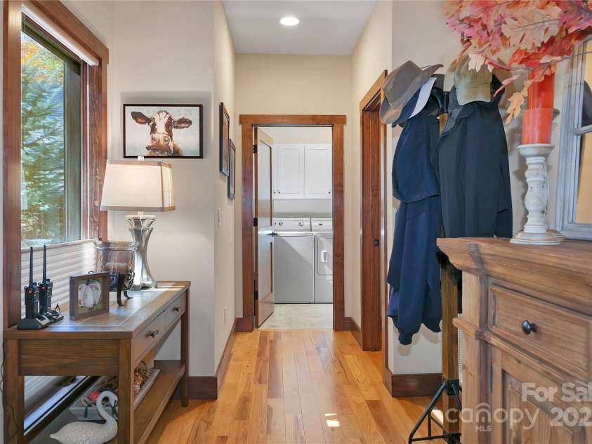1291 Indian Camp Mountain Road, Rosman, NC 28772.  MLS# CAR4282700, YatesRealty ID 2499. Foyer towards laundry