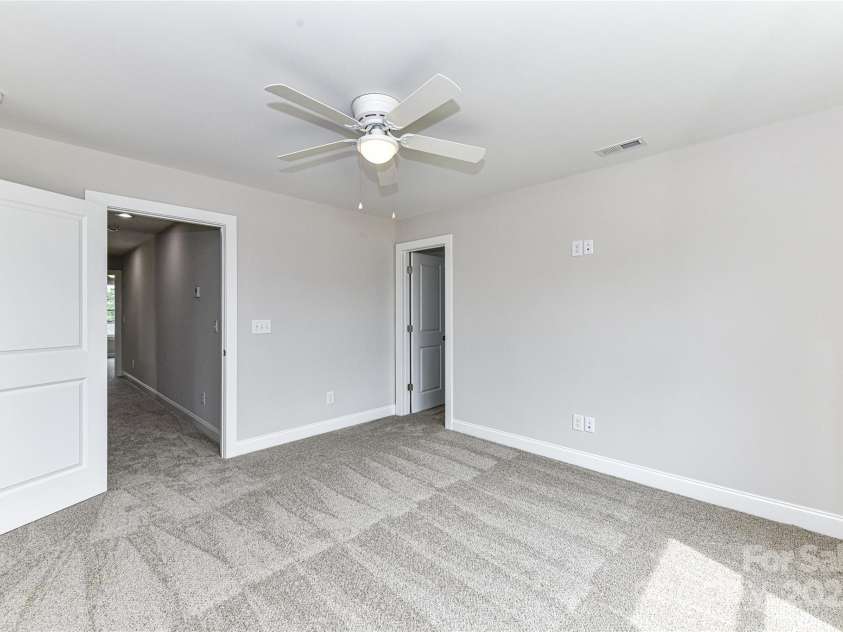 181 Lone Pine Road, Statesville, NC 28625.  MLS# CAR4265324, YatesRealty ID 24990. Secondary Bedroom on upper level with ceiling fan/light!