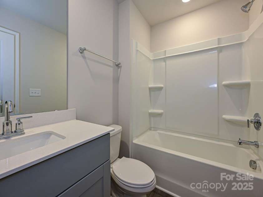 6114 Starview Terrace, Charlotte, NC 28216.  MLS# CAR4265860, YatesRealty ID 24991. Photo is not of the actual home, but is an inspirational photo of builder’s model home and may depict options, furnishings, and/or decorator features that are not included