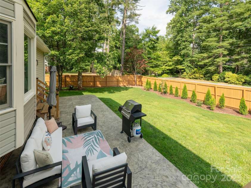 502 Windsor Forest Court, Fletcher, NC 28732.  MLS# CAR4270886, YatesRealty ID 24992. Rear Patio
