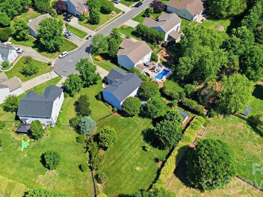 1411 Kronas Circle, Waxhaw, NC 28173.  MLS# CAR4383292, YatesRealty ID 25001. .49 acres with large fenced, back yard