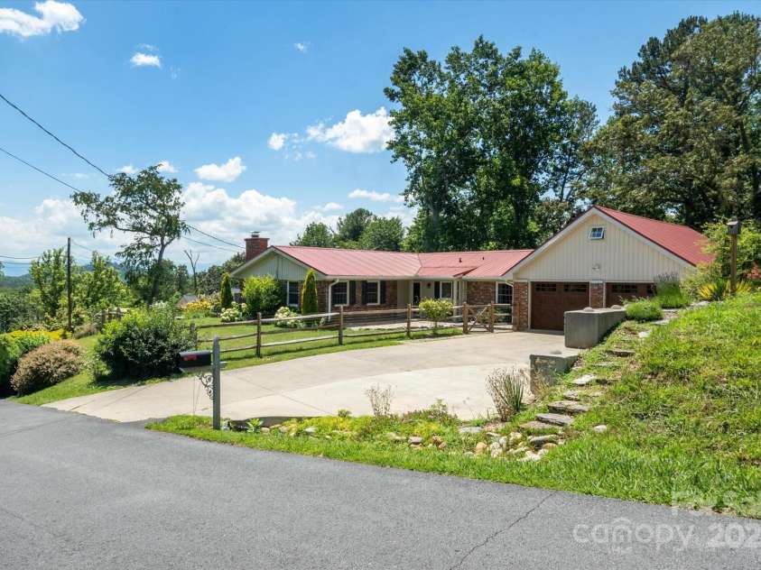 88 Gibson Road, Asheville, NC 28804.  MLS# CAR4276724, YatesRealty ID 25008. Front of Home - with mountain views!