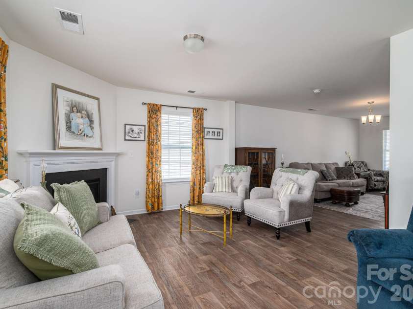 1536 Gaston Mountain Drive, Dallas, NC 28034.  MLS# CAR4385455, YatesRealty ID 25009. Den with the fireplace