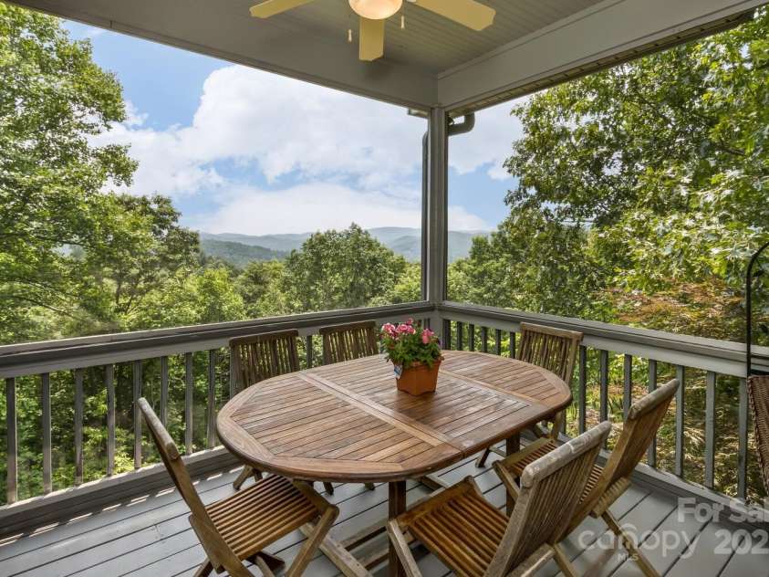 311 Mountain Crest Drive, Hendersonville, NC 28739.  MLS# CAR4268667, YatesRealty ID 25011. Big View Screened Porch