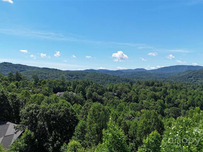 311 Mountain Crest Drive, Hendersonville, NC 28739.  MLS# CAR4268667, YatesRealty ID 25011. Left S. Westerly Deck Level Panorama