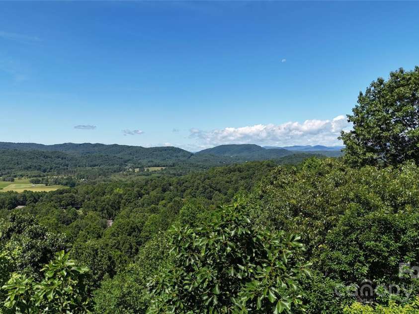 311 Mountain Crest Drive, Hendersonville, NC 28739.  MLS# CAR4268667, YatesRealty ID 25011. Right S. Westerly Deck Level Panorama