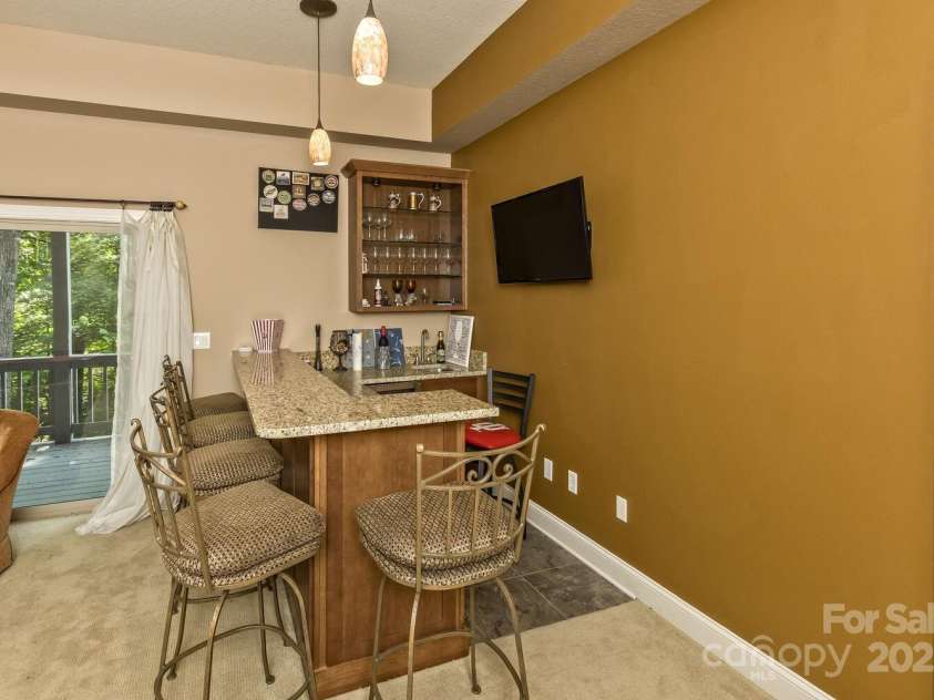 311 Mountain Crest Drive, Hendersonville, NC 28739.  MLS# CAR4268667, YatesRealty ID 25011. Serve it Up