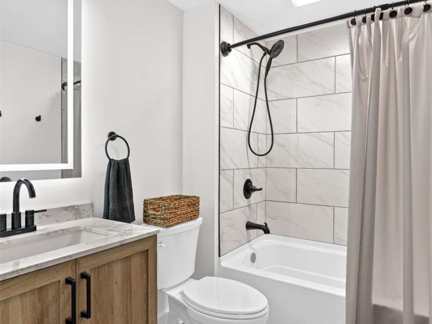 1065 Oak Ridge Lane, Mars Hill, NC 28754.  MLS# CAR4279845, YatesRealty ID 25012. Basement Bathroom