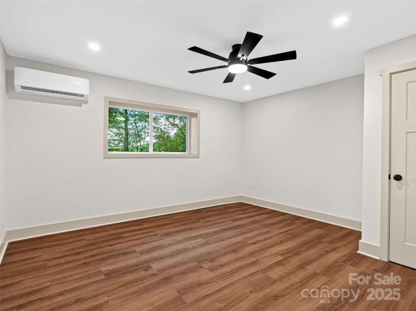 1065 Oak Ridge Lane, Mars Hill, NC 28754.  MLS# CAR4279845, YatesRealty ID 25012. Basement bedroom, 3