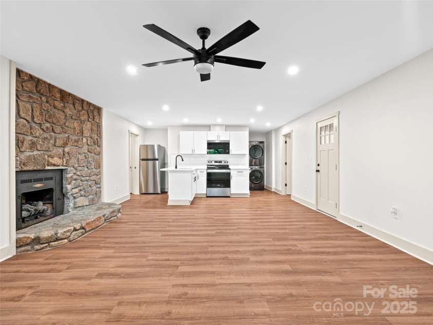 1065 Oak Ridge Lane, Mars Hill, NC 28754.  MLS# CAR4279845, YatesRealty ID 25012. Basement Living and Kitchen