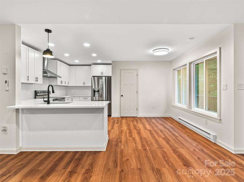 1065 Oak Ridge Lane, Mars Hill, NC 28754.  MLS# CAR4279845, YatesRealty ID 25012. Main Level Kitchen