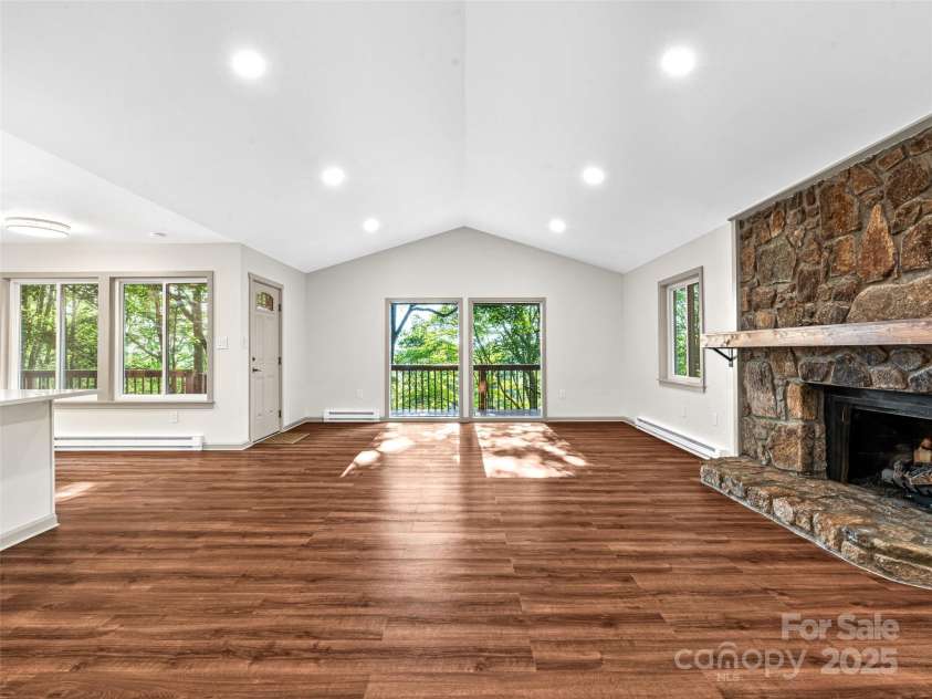 1065 Oak Ridge Lane, Mars Hill, NC 28754.  MLS# CAR4279845, YatesRealty ID 25012. Main level Living Room