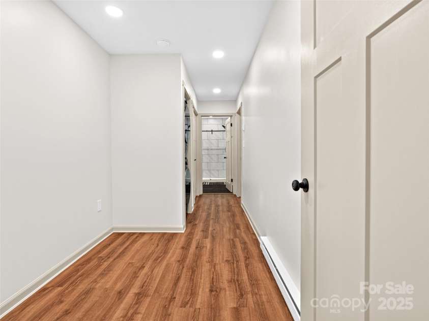 1065 Oak Ridge Lane, Mars Hill, NC 28754.  MLS# CAR4279845, YatesRealty ID 25012. Main Level Primary Suite