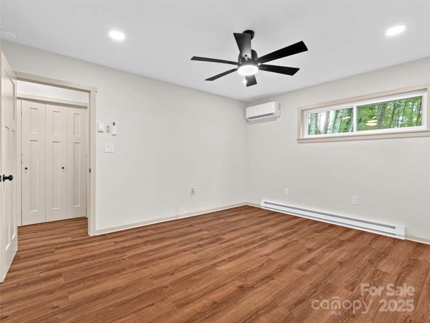 1065 Oak Ridge Lane, Mars Hill, NC 28754.  MLS# CAR4279845, YatesRealty ID 25012. Main Level Primary Suite