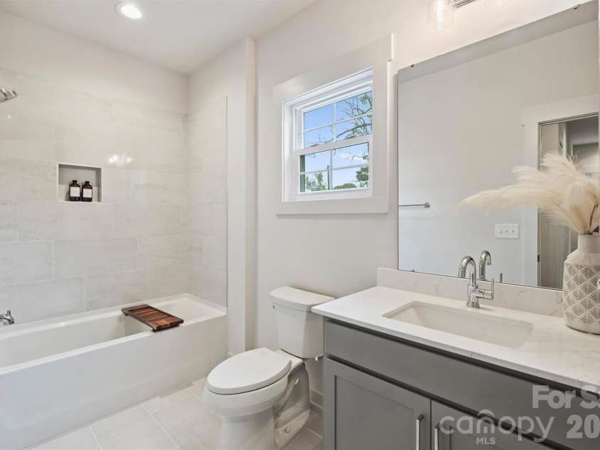 201 Coxe Avenue, Charlotte, NC 28208.  MLS# CAR4381633, YatesRealty ID 25012. Hall bath