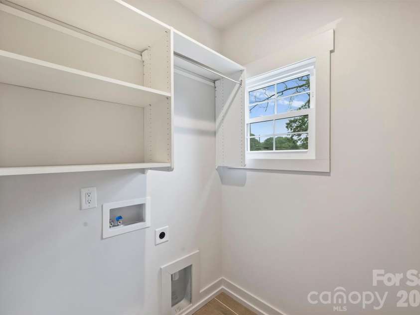 201 Coxe Avenue, Charlotte, NC 28208.  MLS# CAR4381633, YatesRealty ID 25012. Laundry room