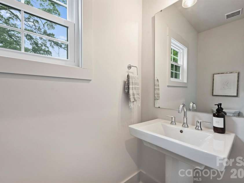 201 Coxe Avenue, Charlotte, NC 28208.  MLS# CAR4381633, YatesRealty ID 25012. Powder room