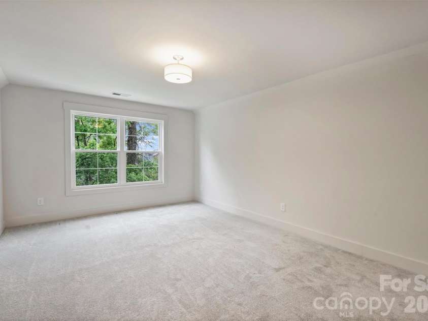 201 Coxe Avenue, Charlotte, NC 28208.  MLS# CAR4381633, YatesRealty ID 25012. Secondary bedroom