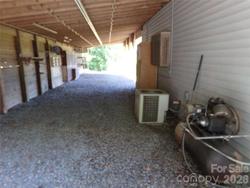 4396 Nc Hwy 200 Highway, Stanfield, NC 28163.  MLS# CAR4380890, YatesRealty ID 25017. Lean too on detached garage