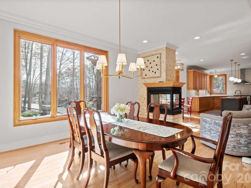 301 Agnew Road, Mooresville, NC 28117.  MLS# CAR4337466, YatesRealty ID 2502. Bright, open dining area with updated lighting. 