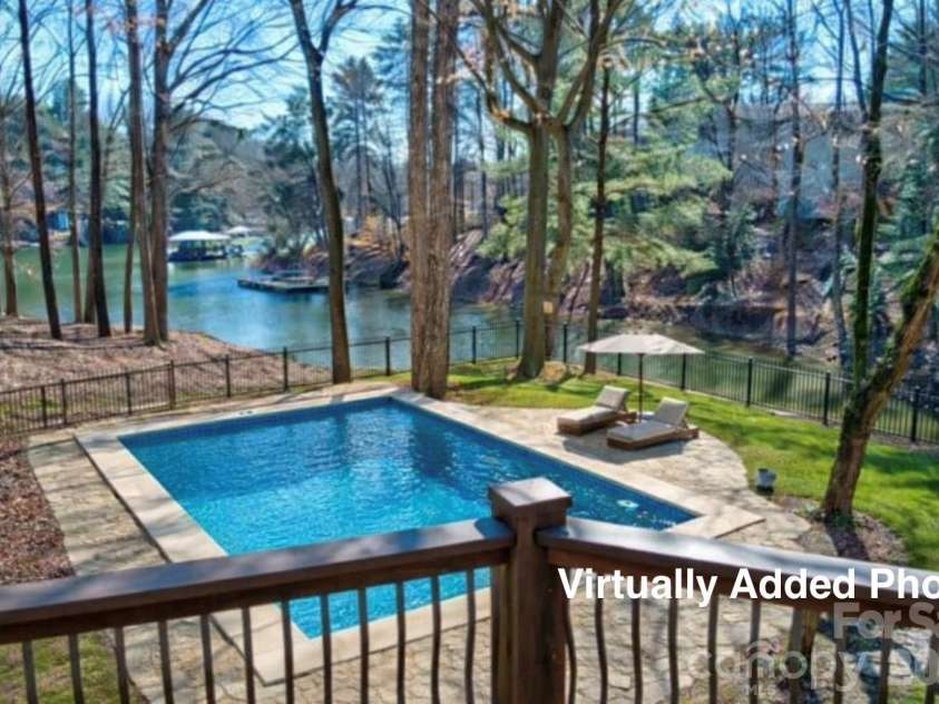 301 Agnew Road, Mooresville, NC 28117.  MLS# CAR4337466, YatesRealty ID 2502. Virtually Added Swimming pool and deck. Styled to see the possibilities. 