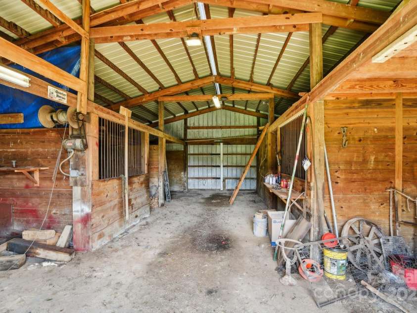 2281 Bearwallow Road, Edneyville, NC 28792.  MLS# CAR4234410, YatesRealty ID 25021. Barn with 6 stalls