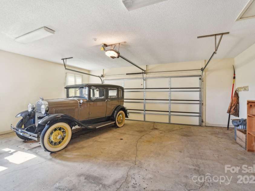 2281 Bearwallow Road, Edneyville, NC 28792.  MLS# CAR4234410, YatesRealty ID 25021. Classic car does not convey!