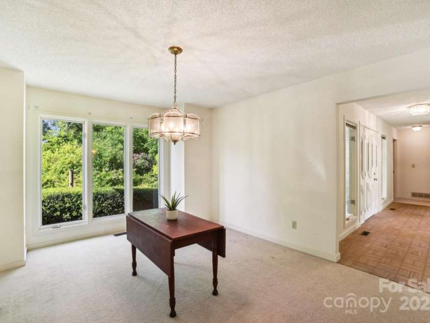 2281 Bearwallow Road, Edneyville, NC 28792.  MLS# CAR4234410, YatesRealty ID 25021. Dining room