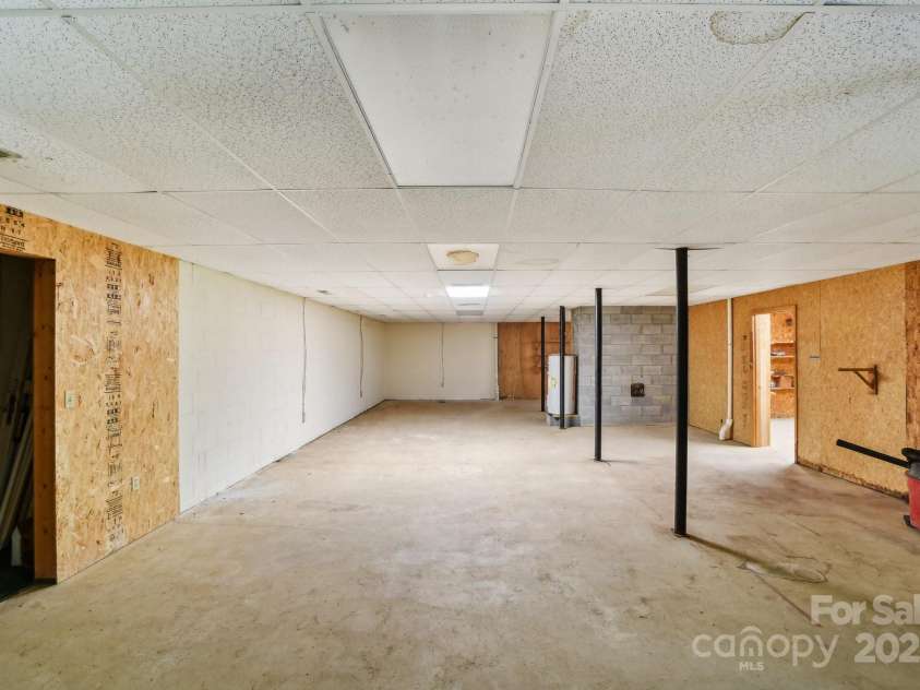 2281 Bearwallow Road, Edneyville, NC 28792.  MLS# CAR4234410, YatesRealty ID 25021. EXPANSIVE basement!
