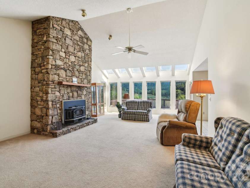 2281 Bearwallow Road, Edneyville, NC 28792.  MLS# CAR4234410, YatesRealty ID 25021. Great room