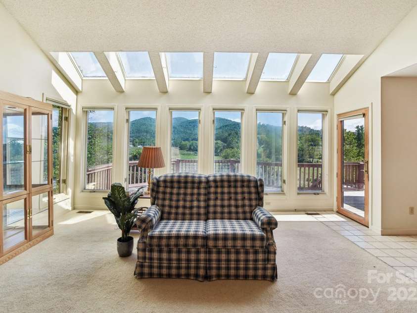 2281 Bearwallow Road, Edneyville, NC 28792.  MLS# CAR4234410, YatesRealty ID 25021. Loads of natural light and mountain views!