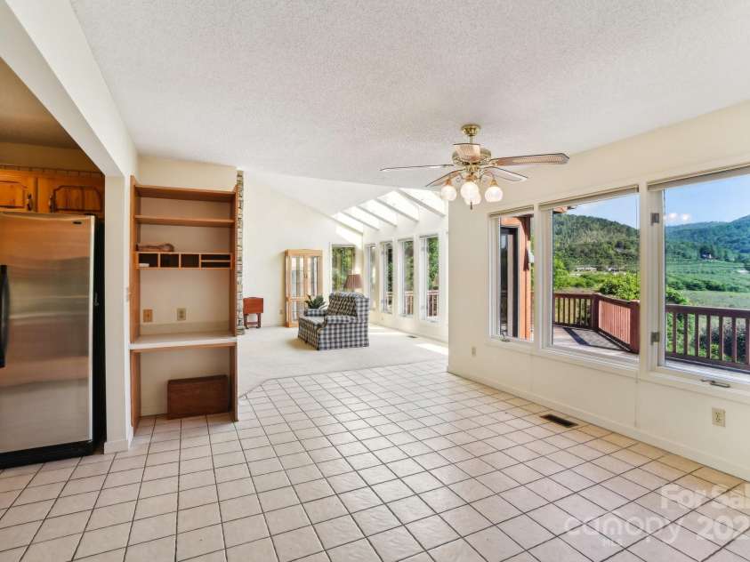 2281 Bearwallow Road, Edneyville, NC 28792.  MLS# CAR4234410, YatesRealty ID 25021. Looking towards living