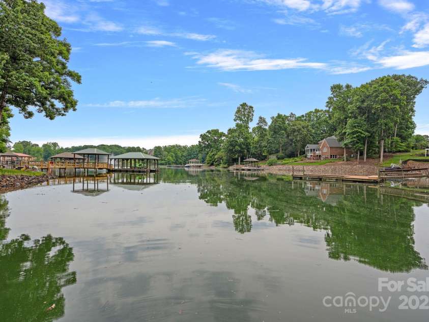 166 Pinnacle Shores Drive, Mooresville, NC 28117.  MLS# CAR4259986, YatesRealty ID 25031. Beautiful deep water cove that is safe and just around the corner from the main channel!