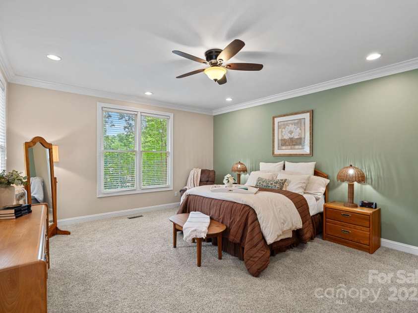 166 Pinnacle Shores Drive, Mooresville, NC 28117.  MLS# CAR4259986, YatesRealty ID 25031. Primary BR with loads of natural light on main level