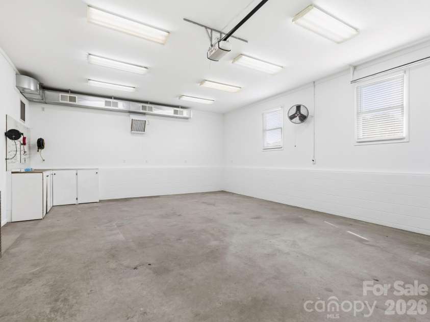 3 Fieldcrest Drive, Candler, NC 28715.  MLS# CAR4379403, YatesRealty ID 25035. Larger garage/workshop/RV parking