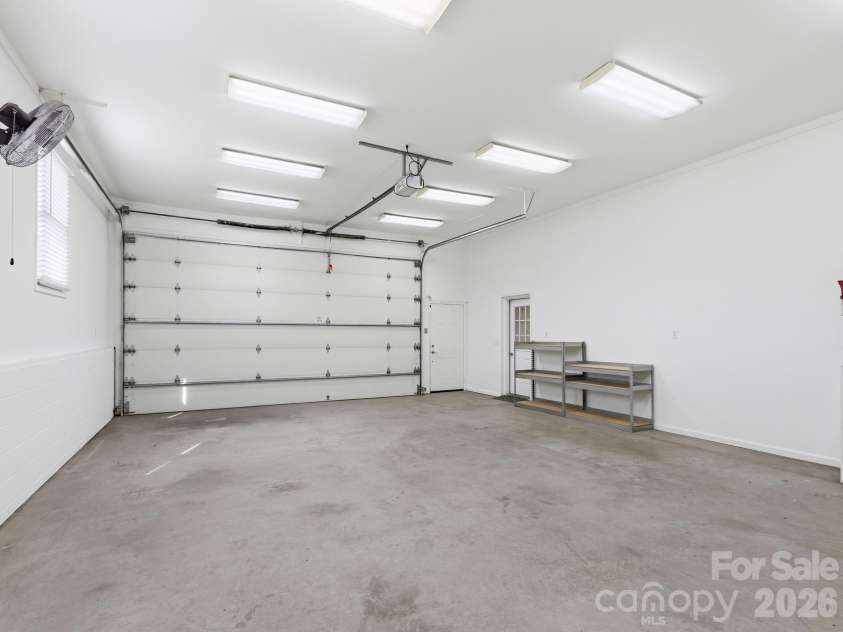 3 Fieldcrest Drive, Candler, NC 28715.  MLS# CAR4379403, YatesRealty ID 25035. Larger garage/workshop/RV parking