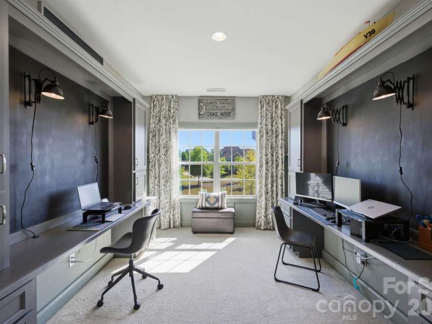 1020 Liggets Drive, Matthews, NC 28104.  MLS# CAR4369265, YatesRealty ID 25040. Built in gaming stations could also be a homework station