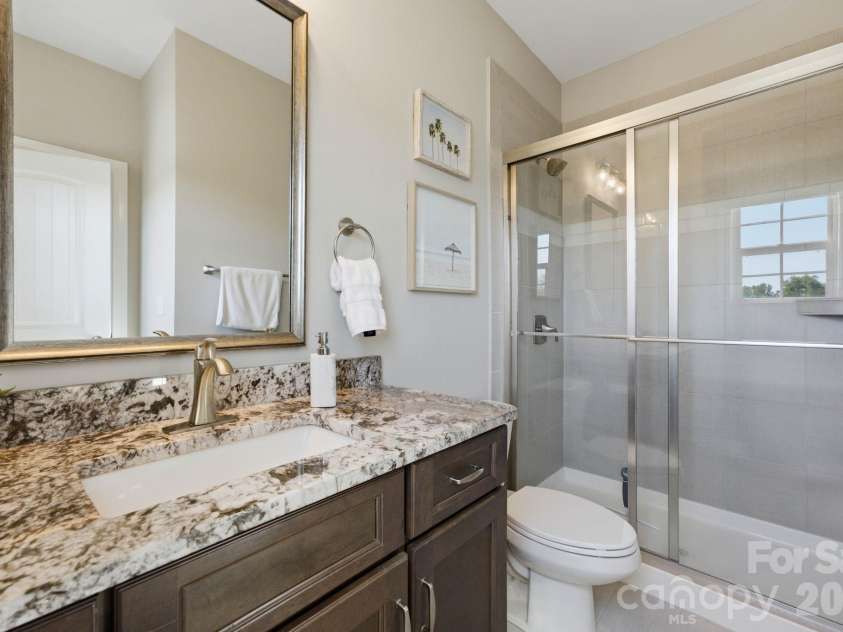 1020 Liggets Drive, Matthews, NC 28104.  MLS# CAR4369265, YatesRealty ID 25040. Ensuite bathroom