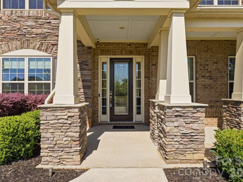 1020 Liggets Drive, Matthews, NC 28104.  MLS# CAR4369265, YatesRealty ID 25040. Inviting front door entryway