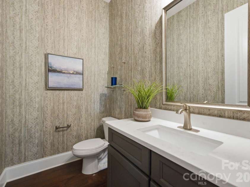 1020 Liggets Drive, Matthews, NC 28104.  MLS# CAR4369265, YatesRealty ID 25040. Main level powder room