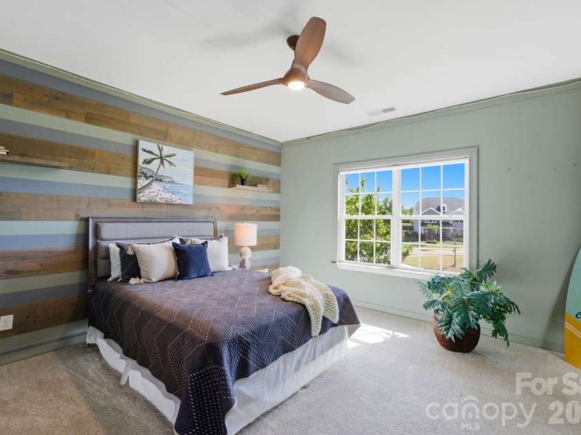 1020 Liggets Drive, Matthews, NC 28104.  MLS# CAR4369265, YatesRealty ID 25040. Secondary bedroom