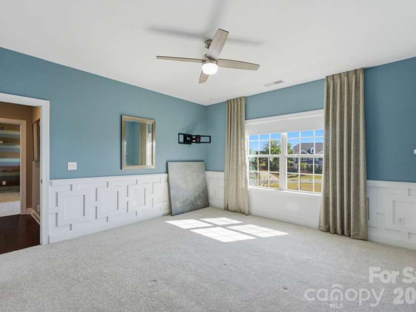 1020 Liggets Drive, Matthews, NC 28104.  MLS# CAR4369265, YatesRealty ID 25040. Secondary bedroom
