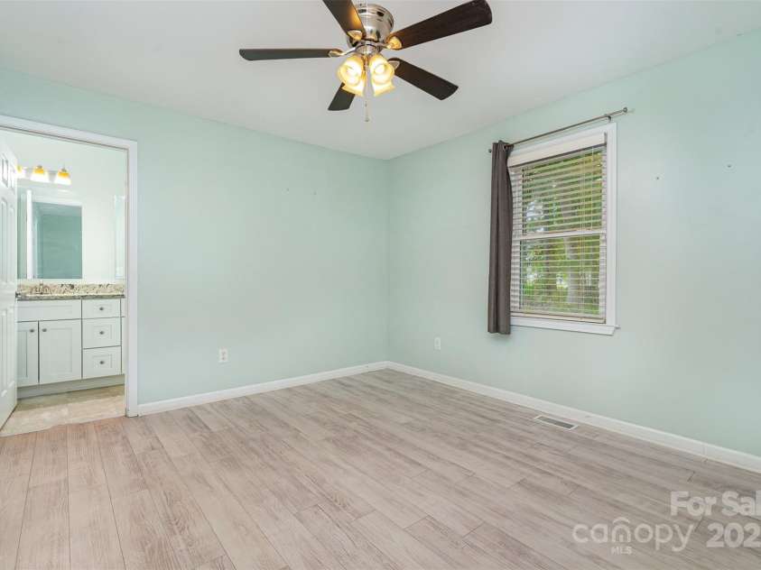 8107 Smith Road, Kannapolis, NC 28081.  MLS# CAR4276804, YatesRealty ID 25042. Primary Bedroom